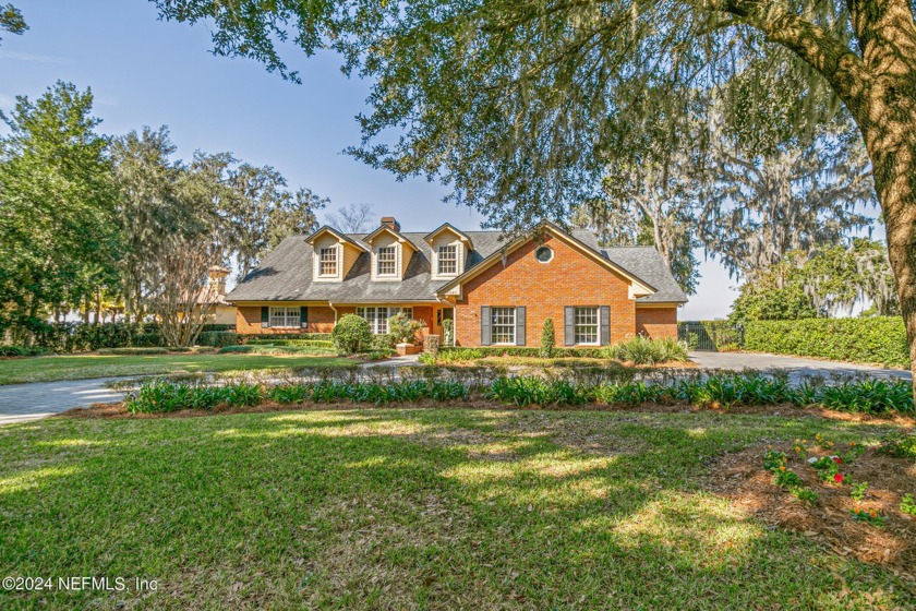 Nestled on more than an acre of lush, riverfront land, this - Beach Home for sale in Jacksonville, Florida on Beachhouse.com
