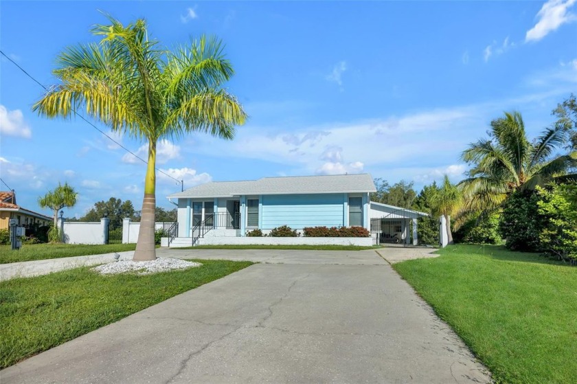 Experience the pinnacle of waterfront living with this - Beach Home for sale in Ruskin, Florida on Beachhouse.com