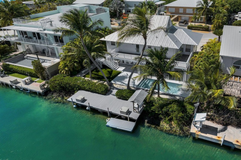 Welcome to paradise! This inviting home features an open-concept - Beach Home for sale in Lower Matecumbe Key, Florida on Beachhouse.com