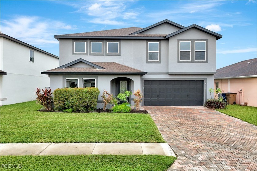 MOTIVATED SELLER. This beautiful two-story home with a two-car - Beach Home for sale in Lehigh Acres, Florida on Beachhouse.com