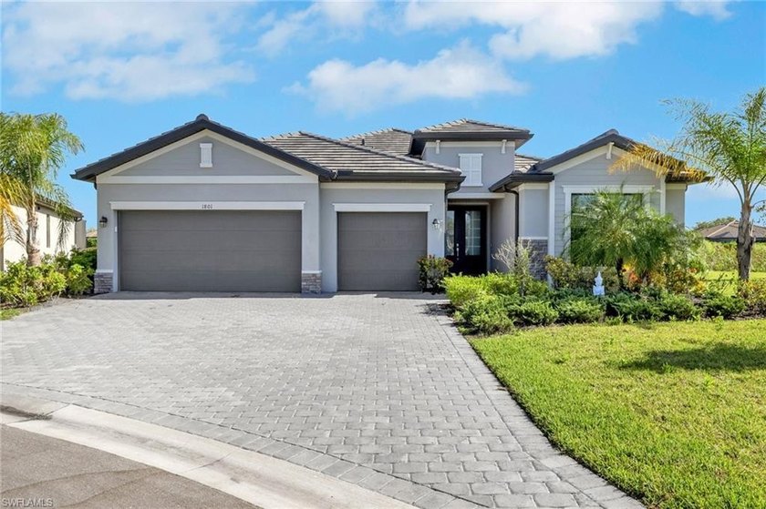 Built in 2022, this lakefront 3-bedroom, 3-bath home with a - Beach Home for sale in Naples, Florida on Beachhouse.com