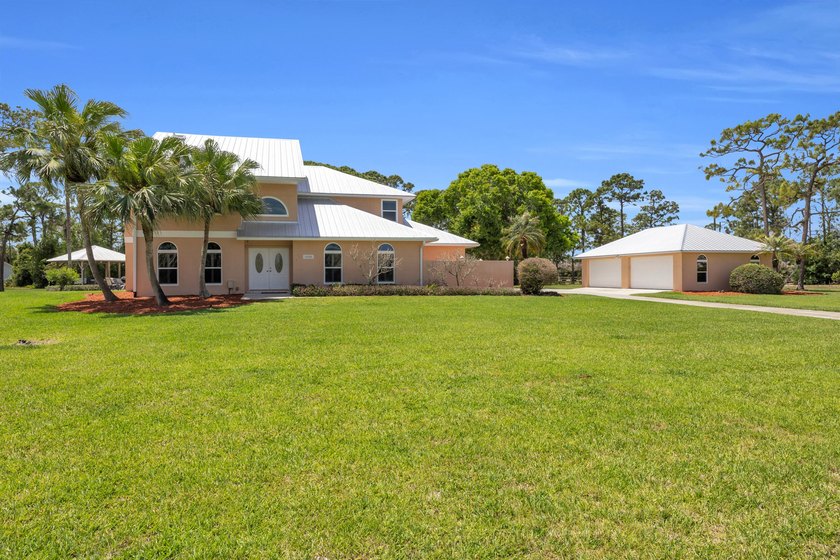Beautiful CBS pool home on 4.4 acres in the highly sought-after - Beach Home for sale in Palm City, Florida on Beachhouse.com
