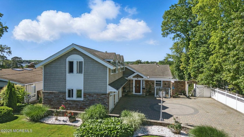 Welcome to 141 Cranmoor Drive, a regal waterfront residence - Beach Home for sale in Toms River, New Jersey on Beachhouse.com