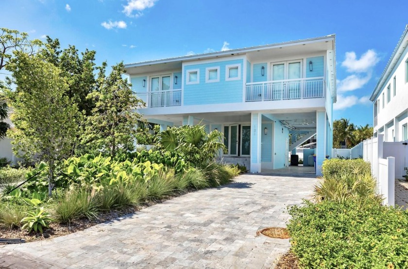 This new construction 4-bedroom, 4-bathroom waterfront residence - Beach Home for sale in Plantation Key, Florida on Beachhouse.com