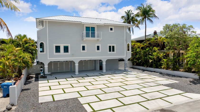 Waterfront Elegance in Venetian Shores - A Turnkey Coastal - Beach Home for sale in Upper Matecumbe Key, Florida on Beachhouse.com