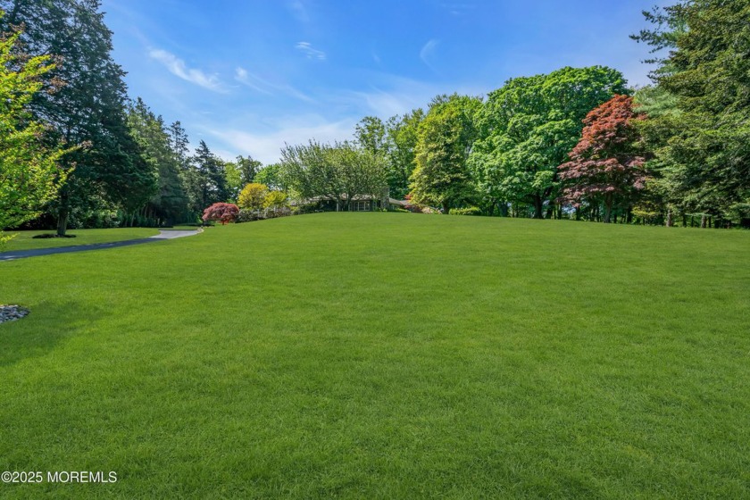 The moment you turn onto the long, winding driveway, you're - Beach Home for sale in Rumson, New Jersey on Beachhouse.com
