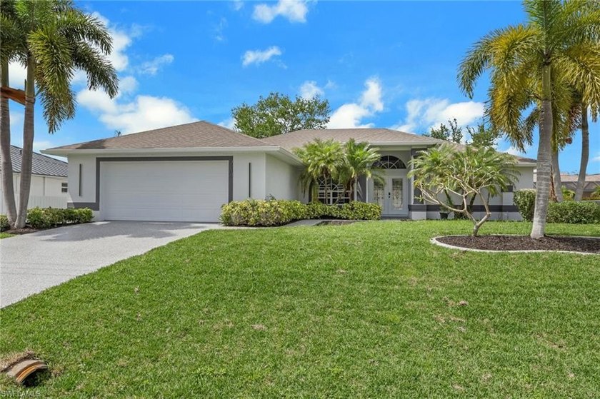 Stunning Completely Remodeled Pool Home! 4BR/3BA pool home with - Beach Home for sale in Cape Coral, Florida on Beachhouse.com
