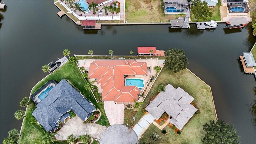 This spectacular, one-of-a-kind waterfront courtyard home offers - Beach Home for sale in Palm Coast, Florida on Beachhouse.com