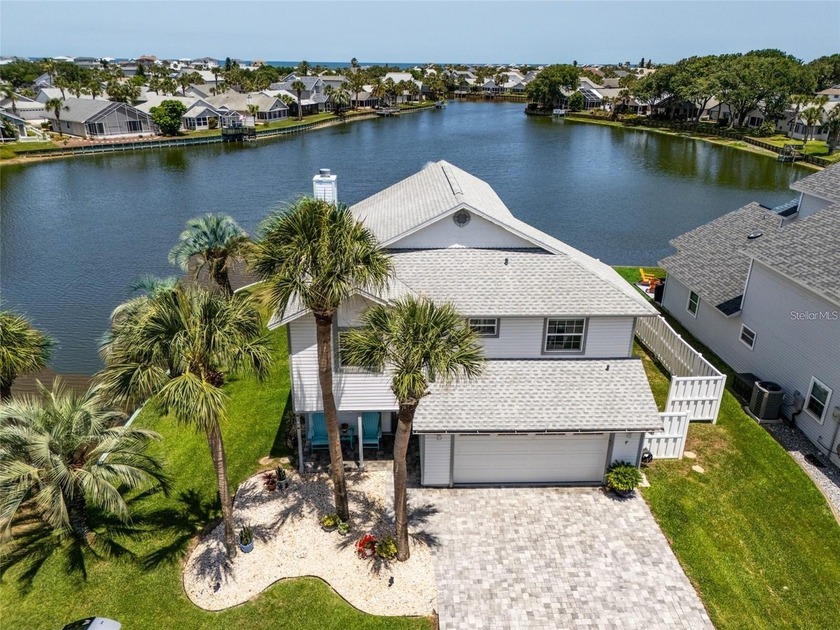 Luxury Living with a spectacular view of a beautiful lake with a - Beach Home for sale in Palm Coast, Florida on Beachhouse.com