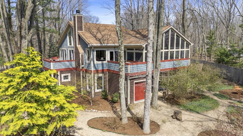 Tucked among the trees in the heart of Harbert, this distinctive - Beach Home for sale in Harbert, Michigan on Beachhouse.com