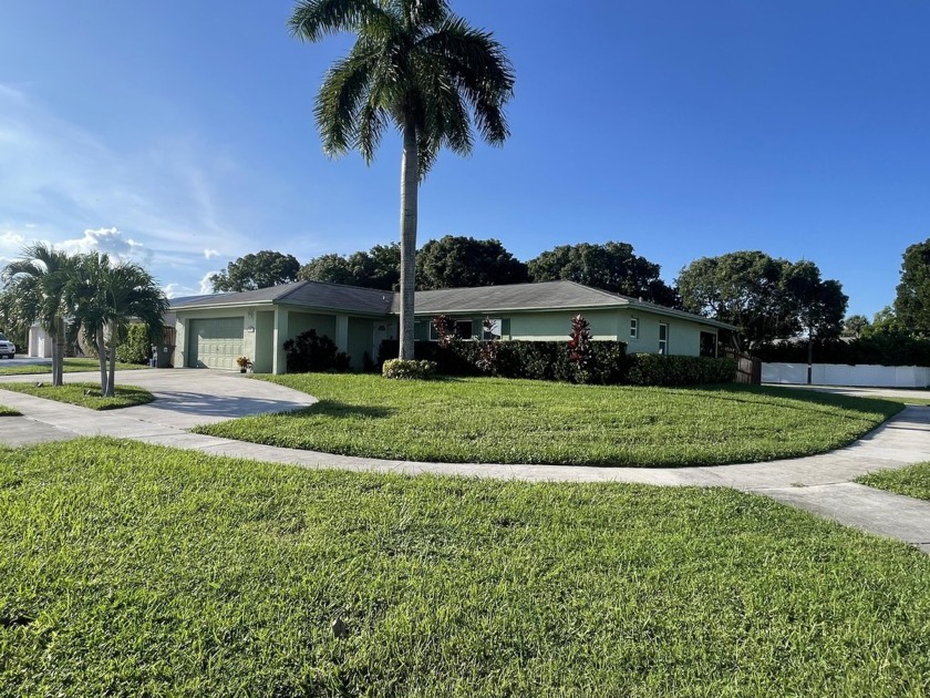 **MOTIVATED SELLER** Come see this beautiful 3/2/2 corner lot - Beach Home for sale in West Palm Beach, Florida on Beachhouse.com