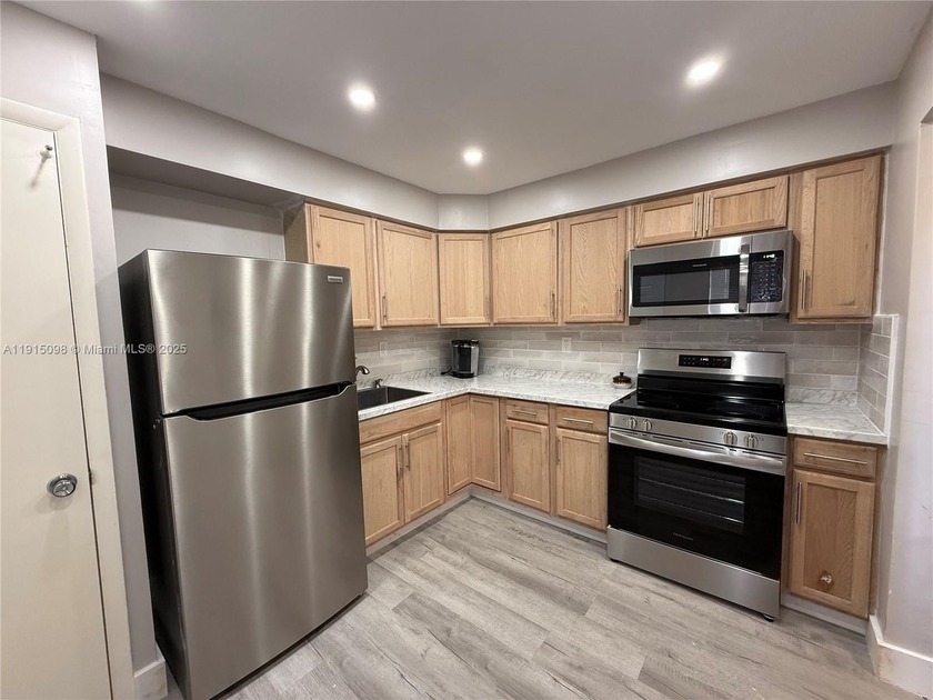 Light, bright, and beautifully updated, this 1 bedroom, 1.5 bath - Beach Condo for sale in Miami, Florida on Beachhouse.com