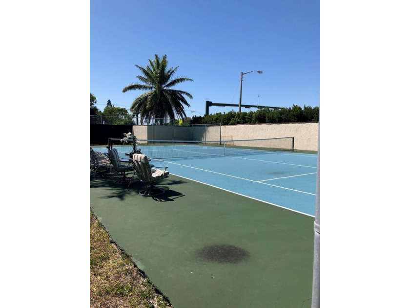 Rare property, no HOA in East Boca with private tennis court - Beach Home for sale in Boca Raton, Florida on Beachhouse.com