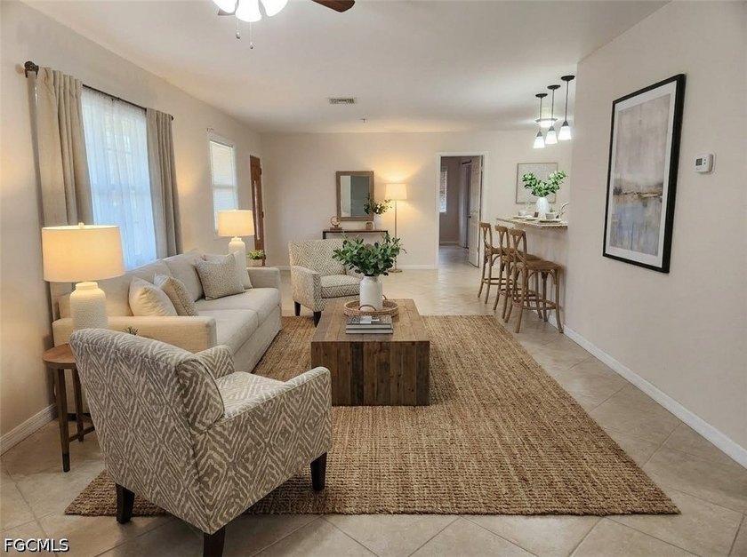 This home is a must-see inside. Rare 4-bedroom, 3-bath layout - Beach Home for sale in Lehigh Acres, Florida on Beachhouse.com