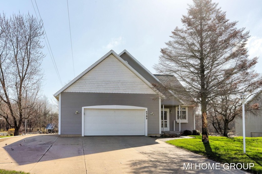 Amazing opportunity to own this freshly remodeled 4 bedroom 3 - Beach Home for sale in Holland, Michigan on Beachhouse.com