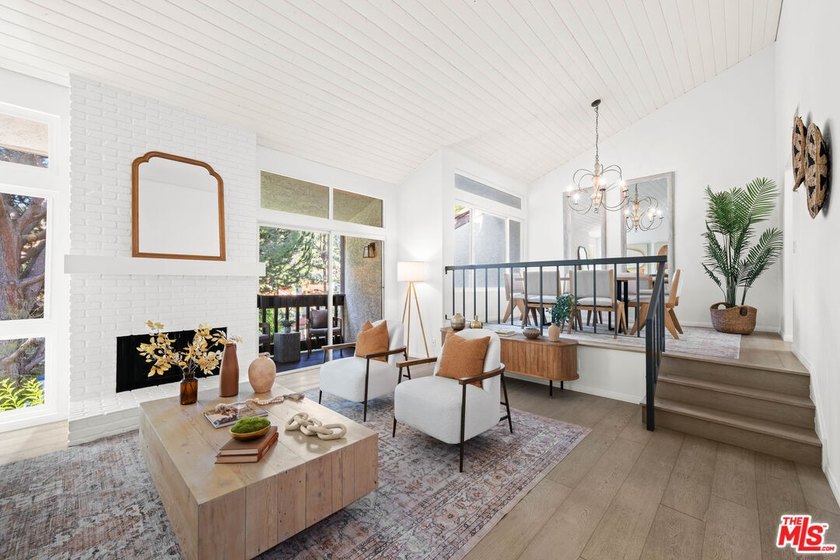 Tucked away in the coveted Palisades Highlands, a dramatic - Beach Condo for sale in Pacific Palisades, California on Beachhouse.com