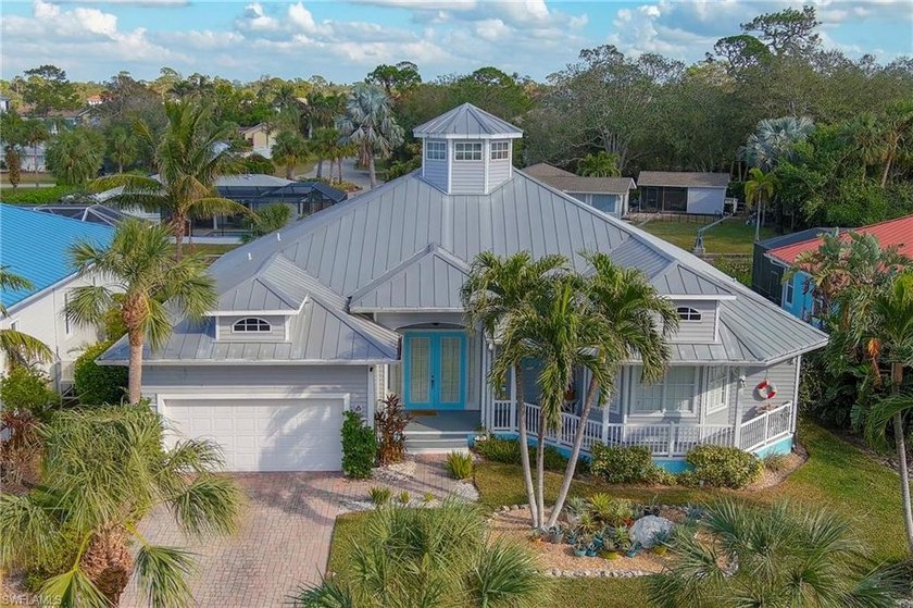 Discover this Key West-style Gulf access pool home located in - Beach Home for sale in Bonita Springs, Florida on Beachhouse.com