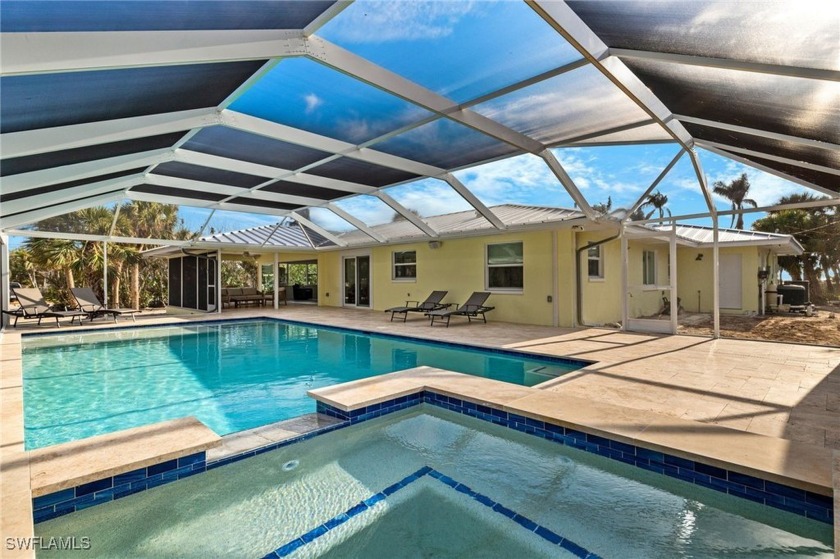 Welcome to an exquisite lakefront oasis just steps from the - Beach Home for sale in Sanibel, Florida on Beachhouse.com