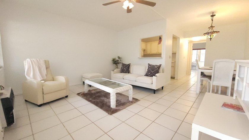Discover easy coastal living in this charming ground-floor condo - Beach Condo for sale in West Palm Beach, Florida on Beachhouse.com