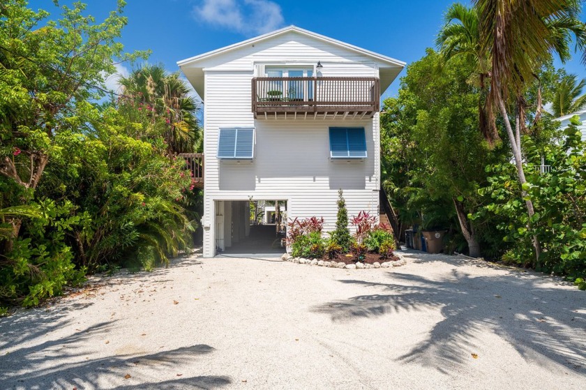 Experience the Ultimate Florida Keys Lifestyle in This - Beach Home for sale in Little Torch Key, Florida on Beachhouse.com