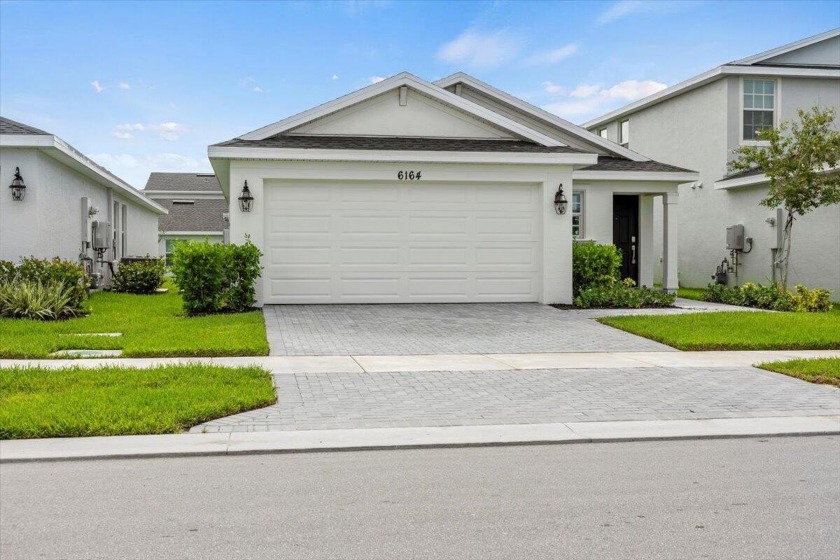 Turn Key-Be the 1st to live in this Brand New Construction. This - Beach Home for sale in Port Saint Lucie, Florida on Beachhouse.com