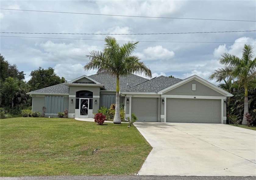 Impressive 4 Bedroom, 3 Bathroom home with attached 3 Car Garage - Beach Home for sale in Punta Gorda, Florida on Beachhouse.com