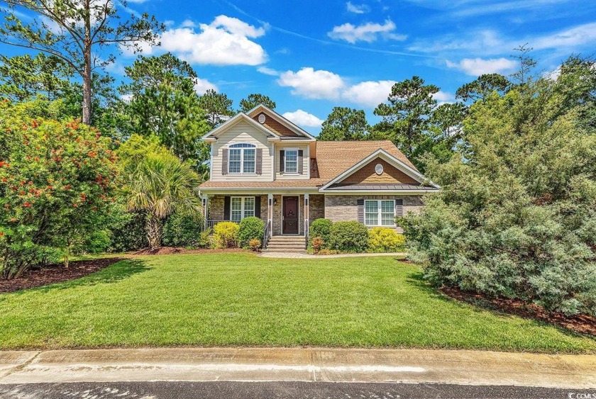 Set on a beautiful homesite in the sought-after Collins Creek - Beach Home for sale in Murrells Inlet, South Carolina on Beachhouse.com