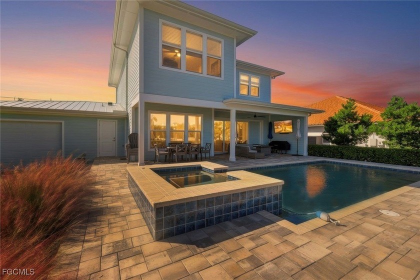 RELAXING POOLSIDE IN PARADISE! Discover luxury waterfront living - Beach Home for sale in Cape Coral, Florida on Beachhouse.com