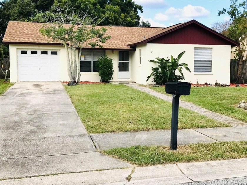 A MUST SEE! Great 4 Bedrooms, 2 Full Bathrooms, 1-story house - Beach Home for sale in New Port Richey, Florida on Beachhouse.com