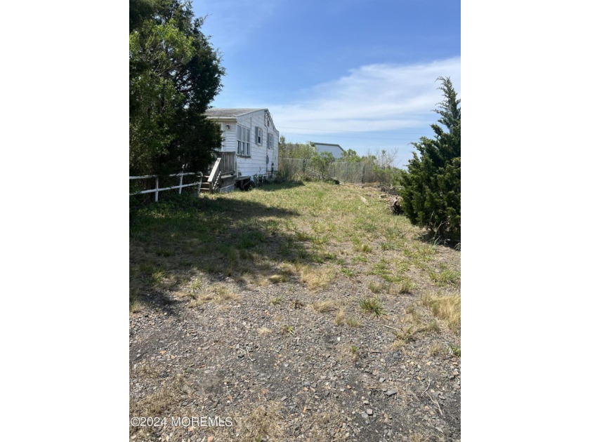 Discover the potential of this unique property! Measuring 100 - Beach Residential Land for sale in West Creek, New Jersey on Beachhouse.com