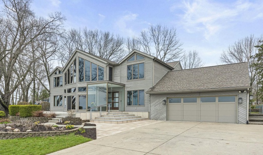 Amazing sunsets and a quiet, sandy Lake Michigan beach await you - Beach Home for sale in Stevensville, Michigan on Beachhouse.com