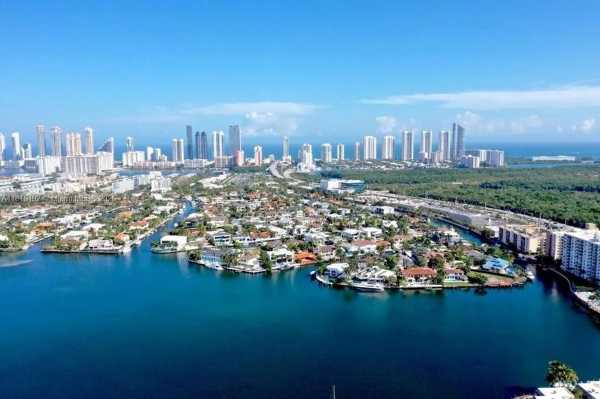 Spacious 2BD/2BA top-floor corner unit at Reef Club South with - Beach Condo for sale in North Miami Beach, Florida on Beachhouse.com