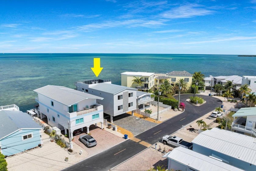 Stunning Oceanfront Three-Story Masterpiece with Unobstructed - Beach Home for sale in Key Largo, Florida on Beachhouse.com