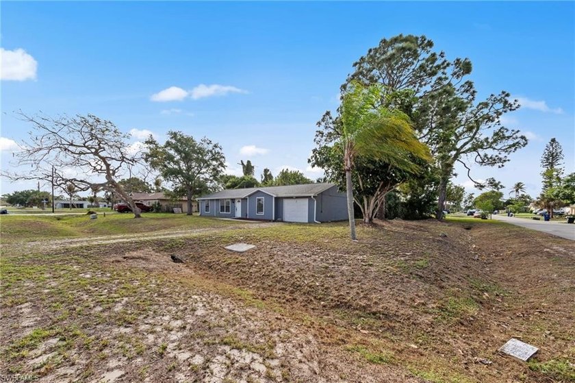 Set on a desirable corner lot in San Carlos Park, this 2-bedroom - Beach Home for sale in Fort Myers, Florida on Beachhouse.com