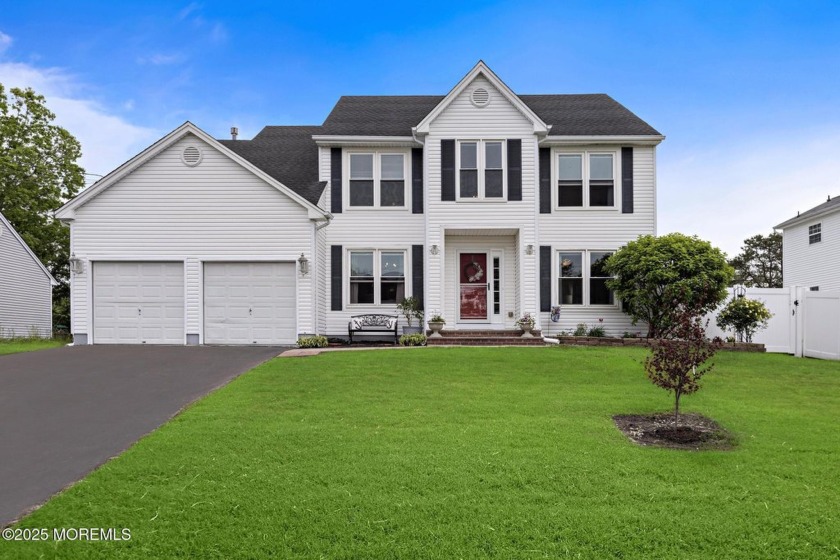 Welcome Home to this 153 Neptune Dr. Knockout! Luxury awaits in - Beach Home for sale in Manahawkin, New Jersey on Beachhouse.com