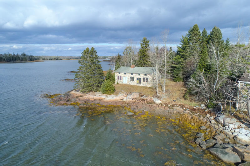 This unique Water Front Stone house perched on the banks of the - Beach Home for sale in Harrington, Maine on Beachhouse.com