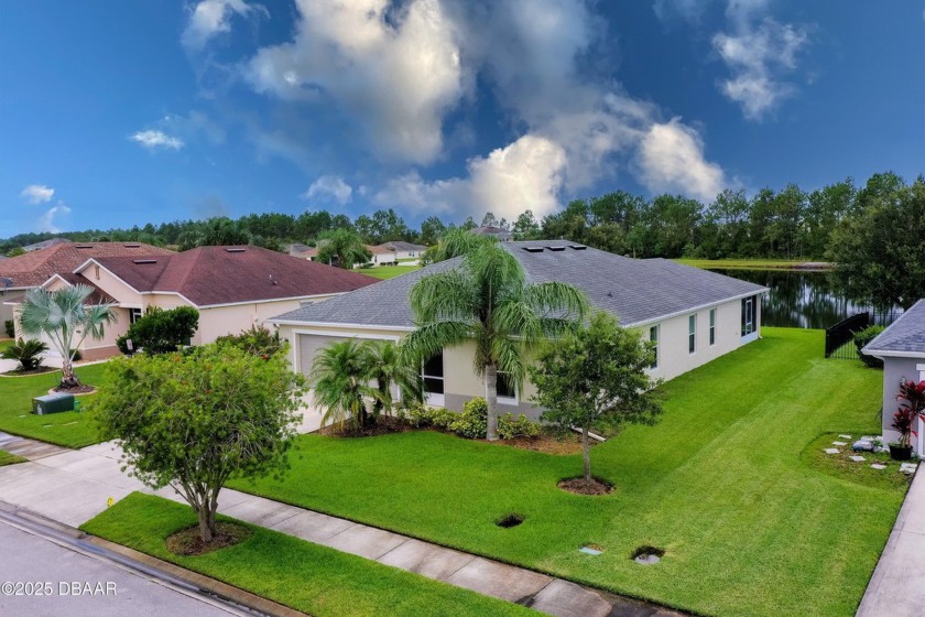 Discover lakefront living at its finest in this beautifully - Beach Home for sale in Daytona Beach, Florida on Beachhouse.com