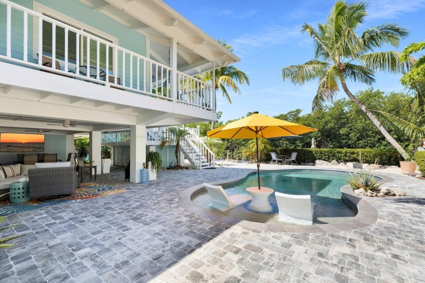 This is the Florida Keys lifestyle done right! Located just 4 - Beach Home for sale in Marathon, Florida on Beachhouse.com