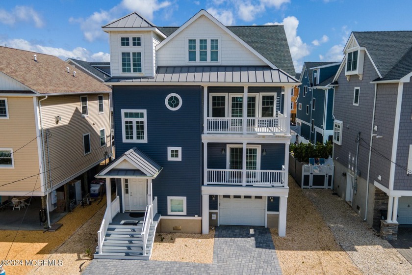 Beautiful custom home is ideally located on the oceanblock in - Beach Home for sale in Mantoloking, New Jersey on Beachhouse.com