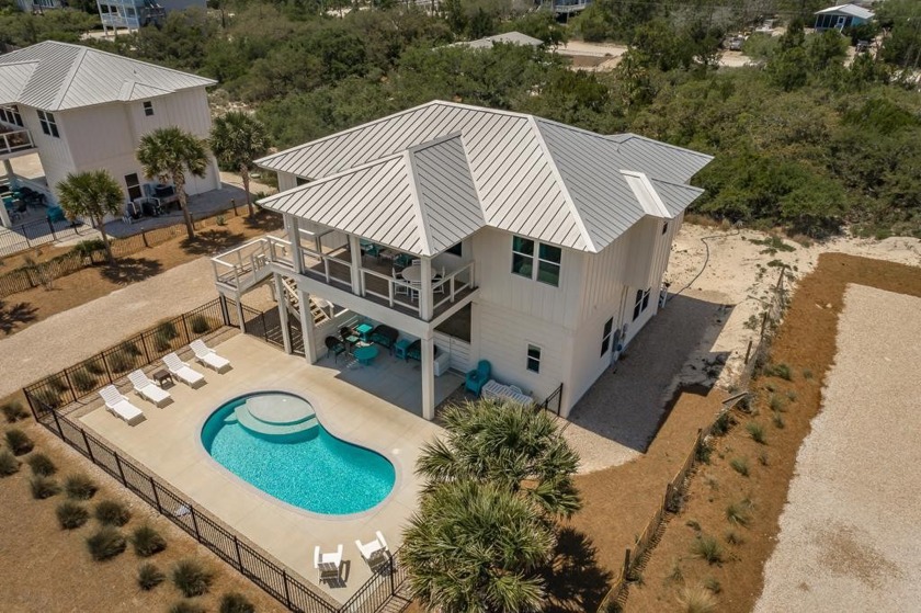 Newly constructed in 2020, *Little Kokomo* is a beautiful 4 bdrm - Beach Home for sale in St. George Island, Florida on Beachhouse.com