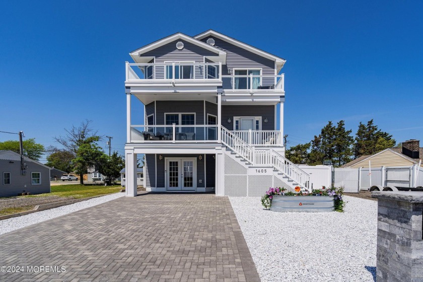 Nestled in the serene coastal landscape of Lacey Township, this - Beach Home for sale in Forked River, New Jersey on Beachhouse.com