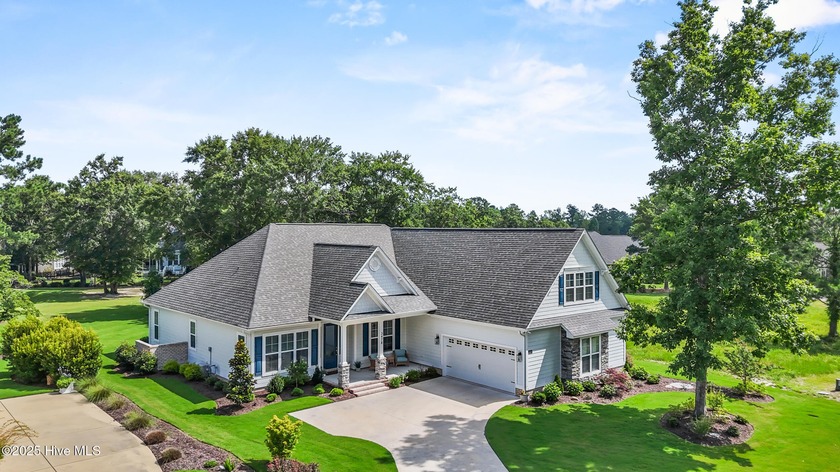 Experience luxury living in Leland's premier gated community at - Beach Home for sale in Leland, North Carolina on Beachhouse.com