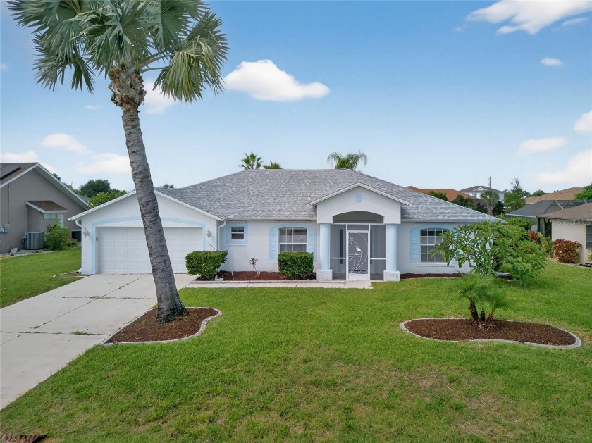 DEEP CREEK! This 3-BEDROOM, 2-BATH, 2-CAR GARAGE POOL HOME IN - Beach Home for sale in Punta Gorda, Florida on Beachhouse.com