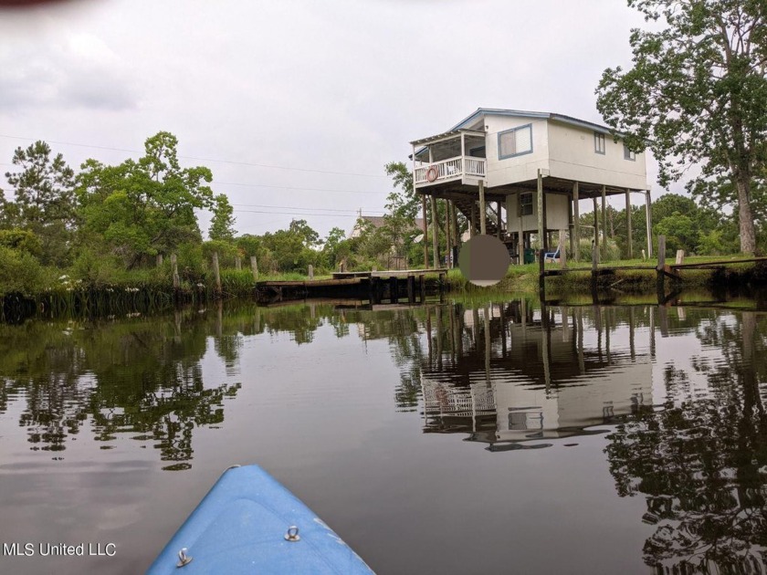 This is the ultimate. 3BR 2BA waterfront on large lot with deep - Beach Home for sale in Bay Saint Louis, Mississippi on Beachhouse.com