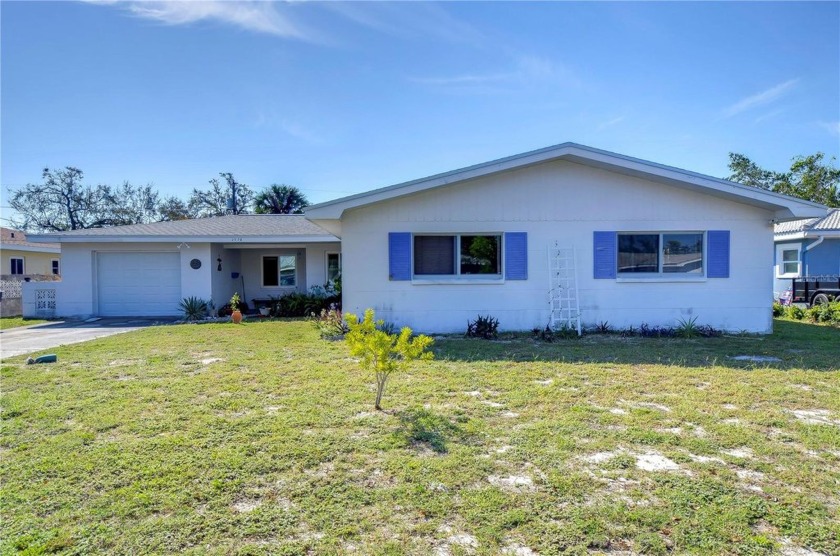 Welcome home to this spacious retreat, ideally situated in the - Beach Home for sale in St. Petersburg, Florida on Beachhouse.com