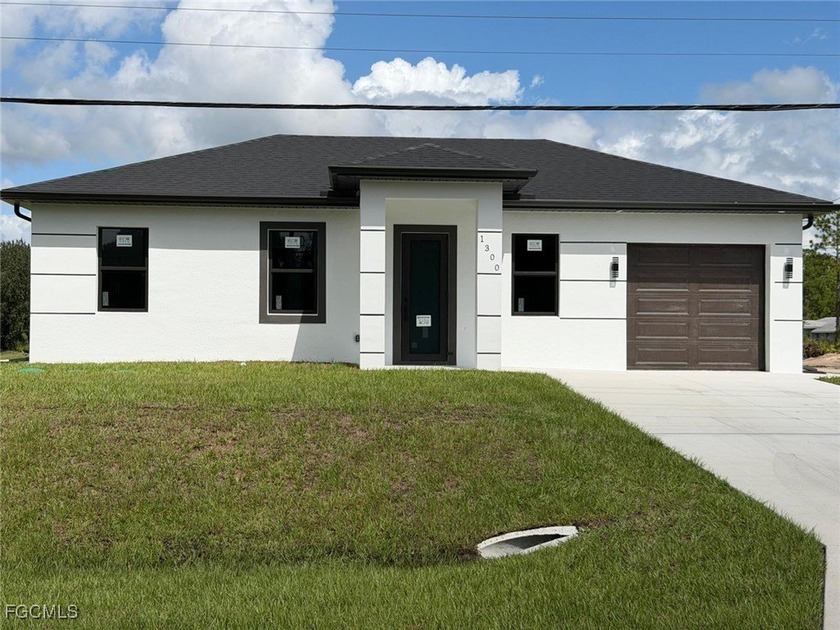 New Construction Home! This modern 3 bedroom, 2 bathroom home - Beach Home for sale in Lehigh Acres, Florida on Beachhouse.com