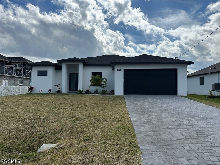 Beautiful 4/3/2 new construction with a beautiful pool on an - Beach Home for sale in Cape Coral, Florida on Beachhouse.com