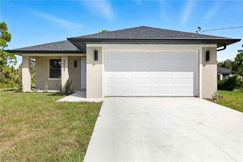Discover this beautiful new construction in Lehigh Acres! The - Beach Home for sale in Lehigh Acres, Florida on Beachhouse.com