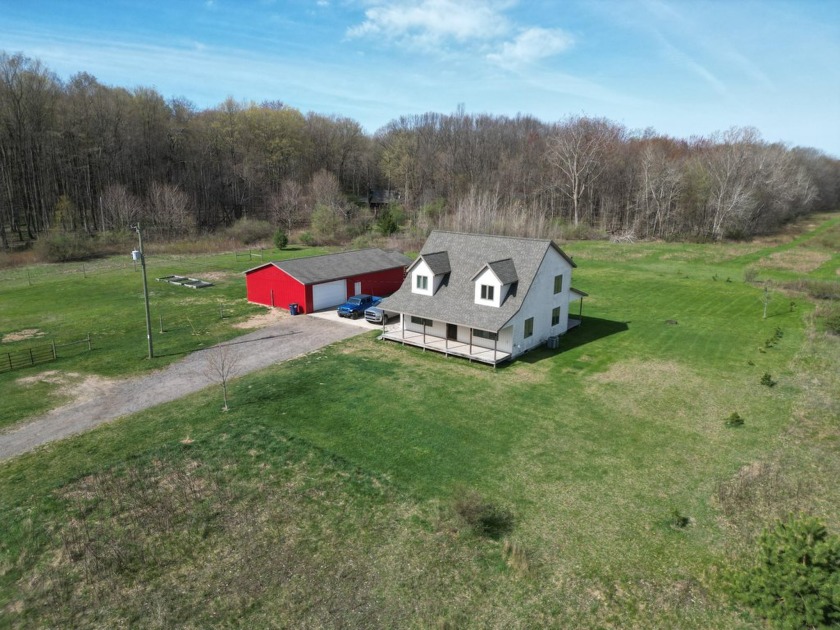 Welcome to 11559 Williams Rd in Montague, MI! Nestled on nearly - Beach Home for sale in Montague, Michigan on Beachhouse.com