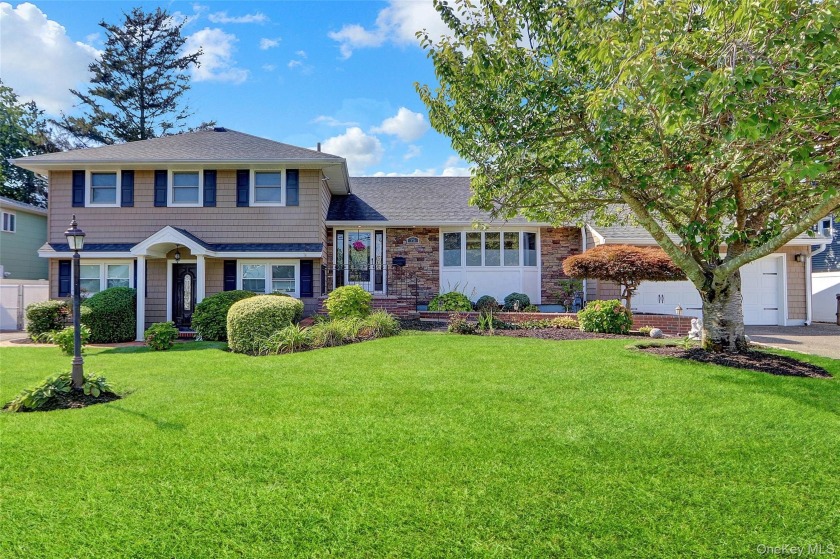 THIS FALL, DONT STALL- THIS SPLIT LEVEL HAS IT ALL...WELCOME TO - Beach Home for sale in Massapequa, New York on Beachhouse.com